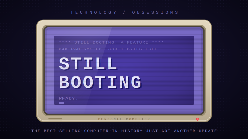 Retro beige CRT monitor displaying a blue boot screen with the headline "Still Booting" above a READY. prompt and block cursor.